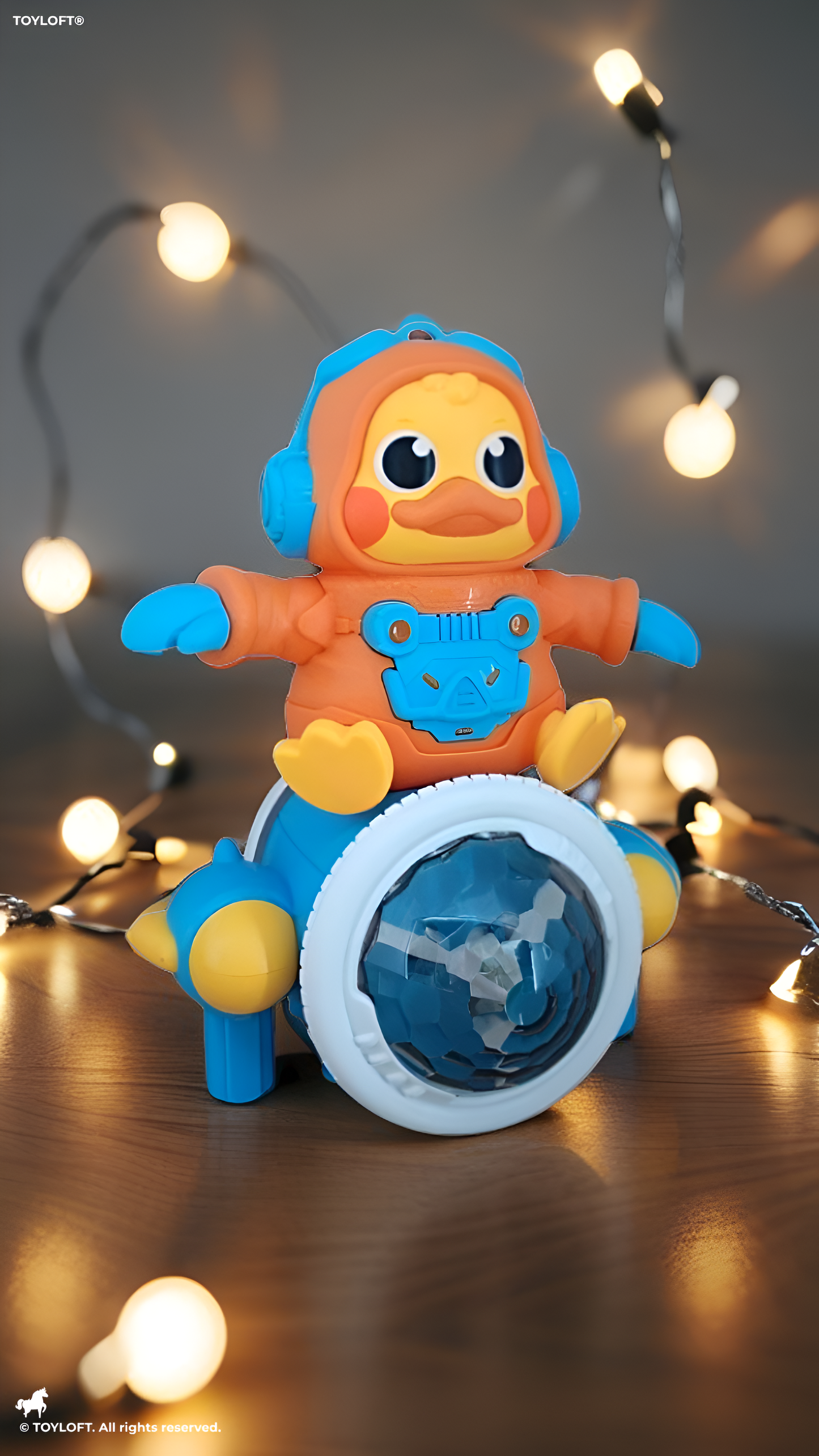 Space Duck Musical Toy – Dancing Duck Robot with LED Lights, Music & 360° Rotating Wheels Orange LMI14255.